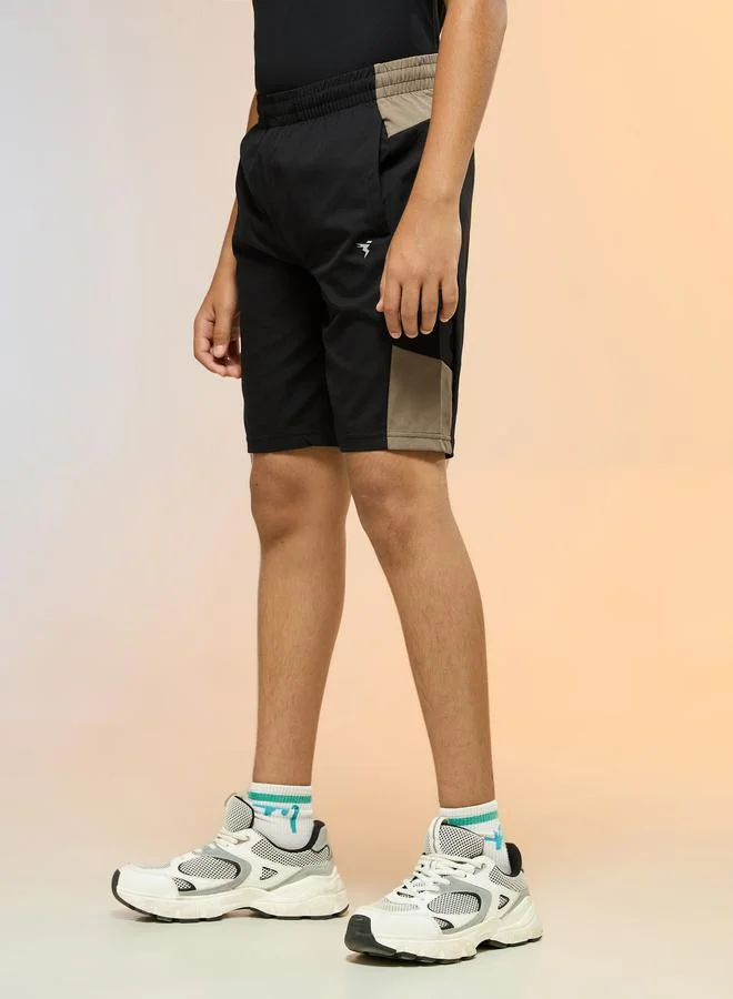 تكنوسبورت شورت رياضي للأولاد بقصة ضيقة